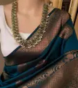 Teal Copper Kanjeevaram Silk Saree with Traditional Zari Border
